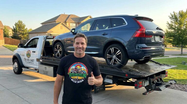 2018 Volvo XC60 loaded on an Auto Recycling Mile High tow truck at a cash-for-cars pickup in the Denver metro